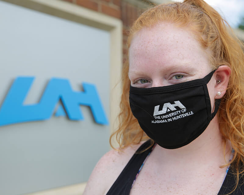 Student wearing a UAH mask.